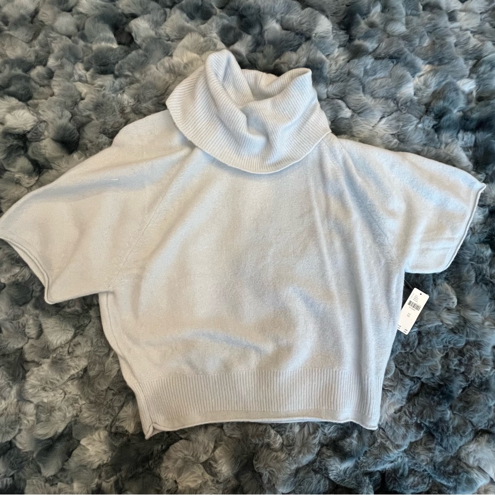 Super soft turtleneck poncho-sleeve sweatshirt, baby blue.